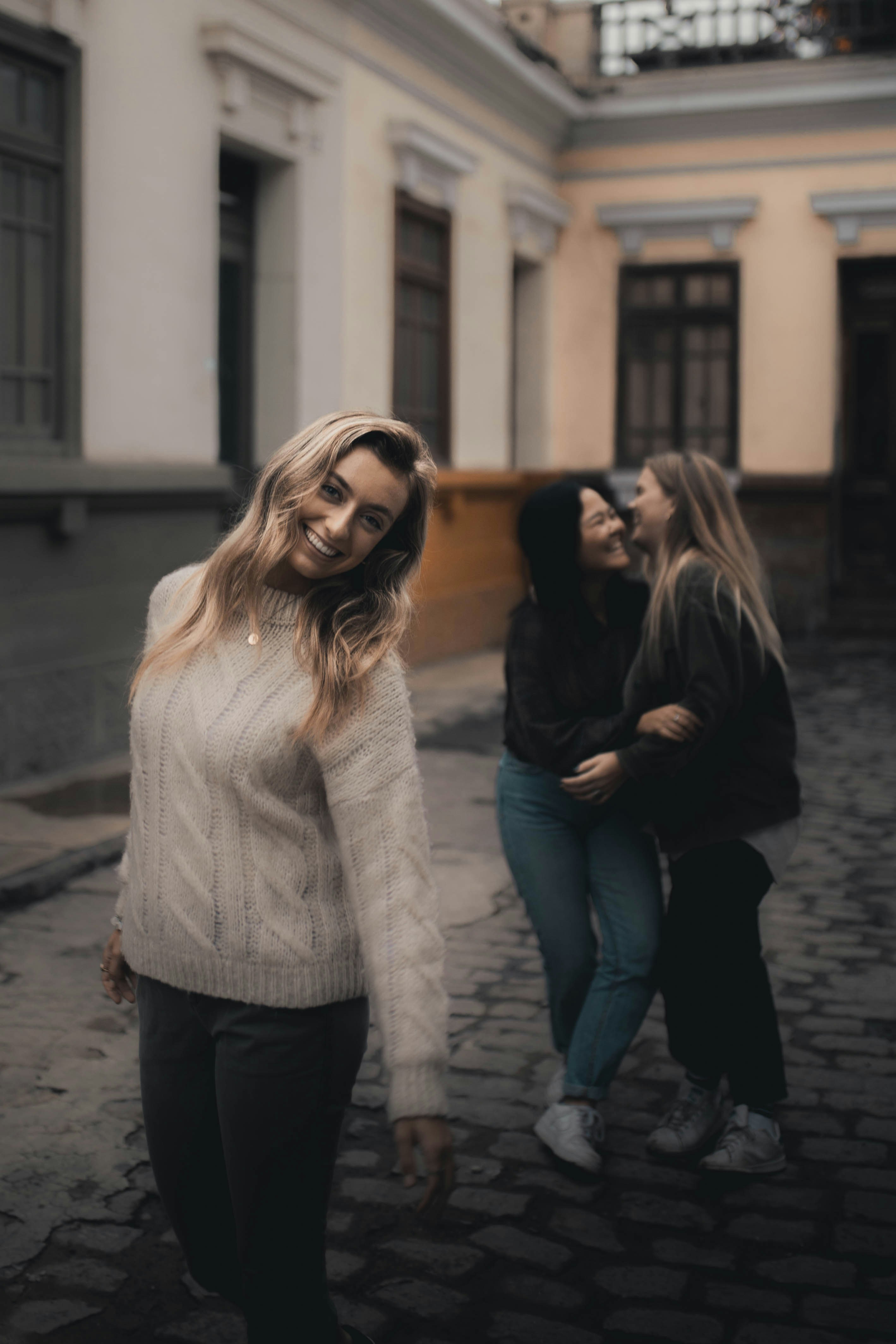 Group of women laughing and enjoying conversation together